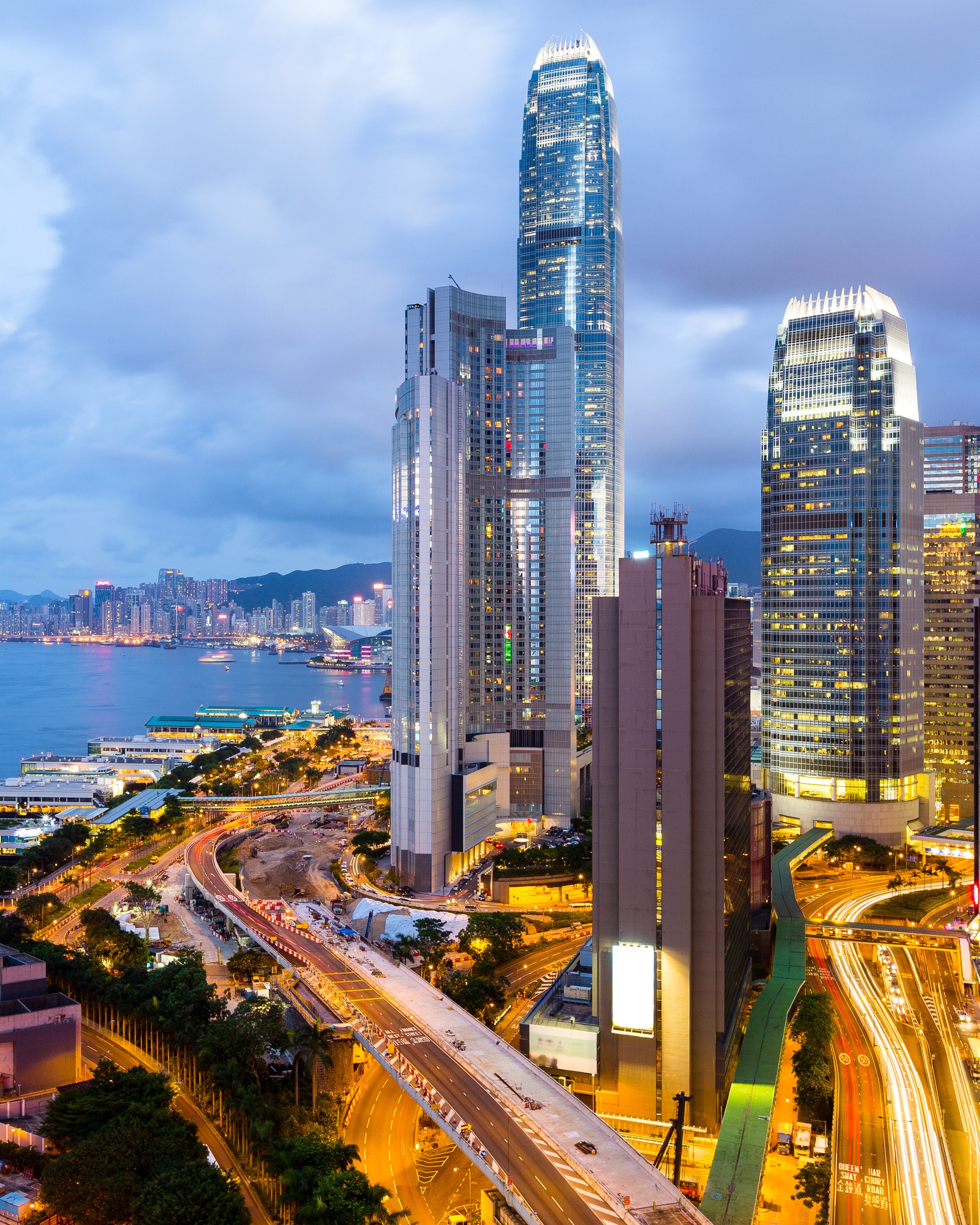 Victoria Harbour and the towers of Hong Kong Island at dusk